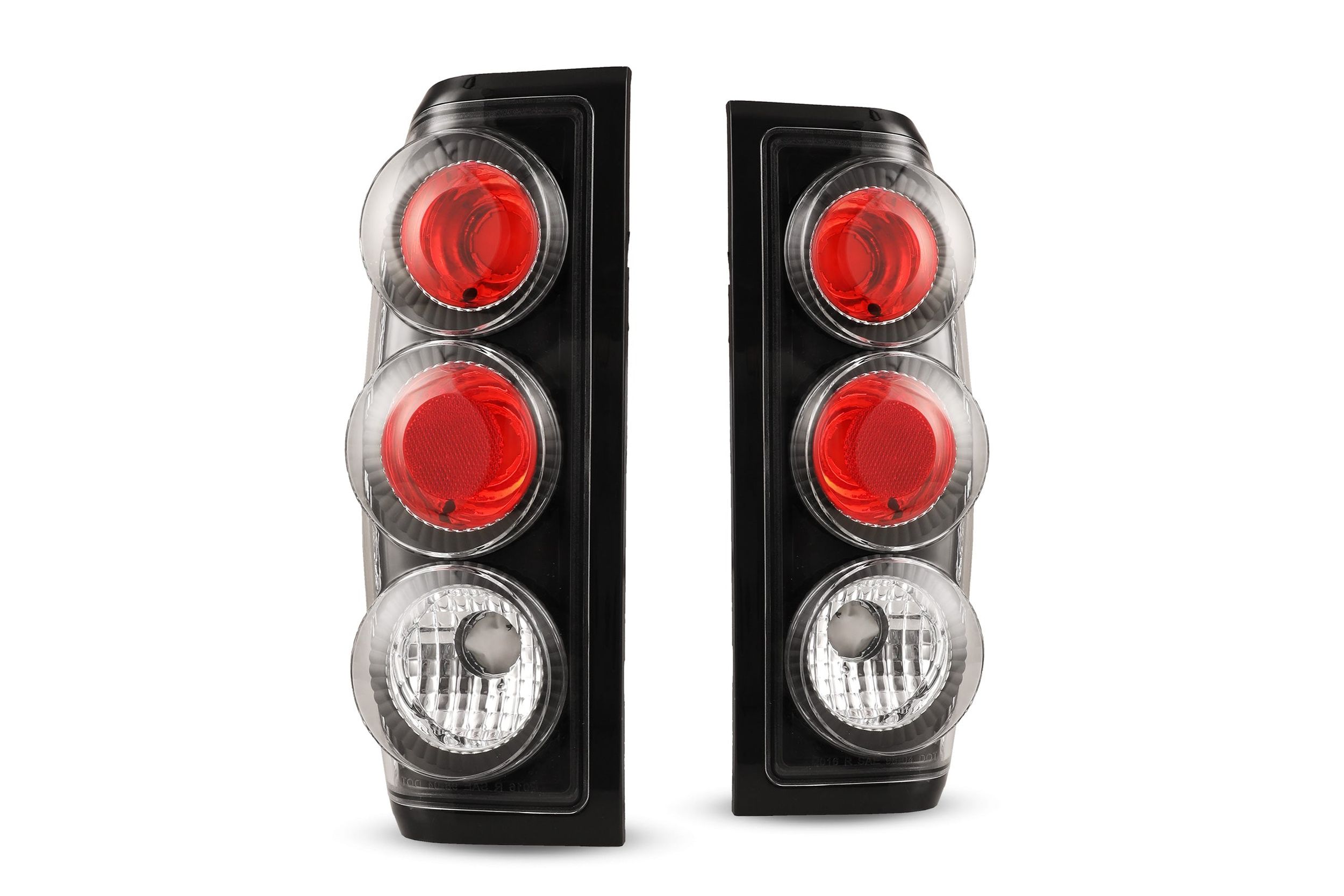 98-04 Nissan Frontier: Winjet Altezza Tail Lights - Black/Clear